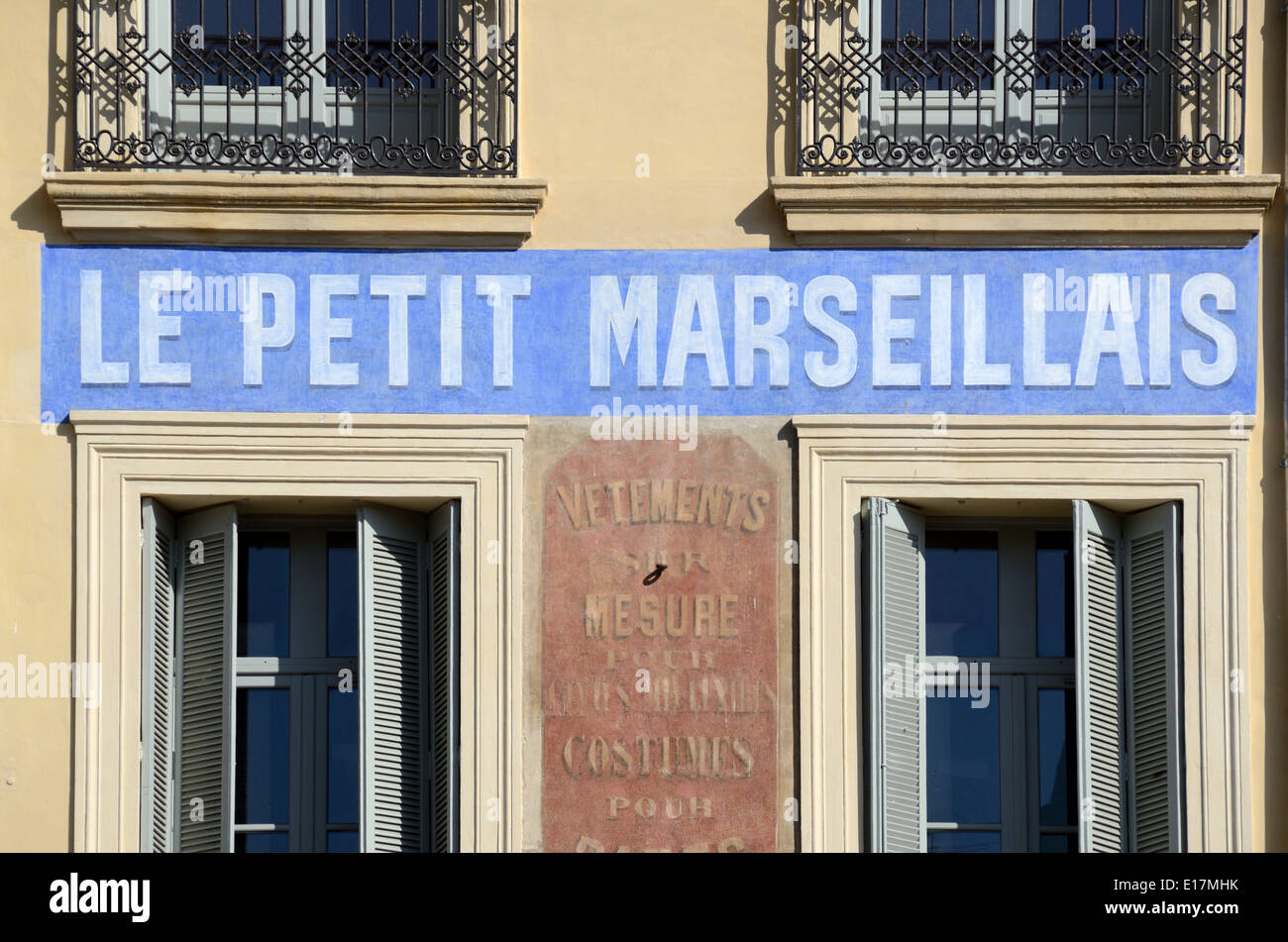 Old Painted Wall Advert for the Le Petit Marseillais Newspaper Cours  Mirabeau Aix-en-Provence Provernce France Stock Photo - Alamy