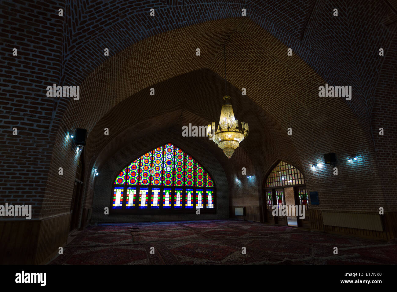 Detailed red brickwork forms the domed roof of a medersa in Tabriz, Iran Stock Photo