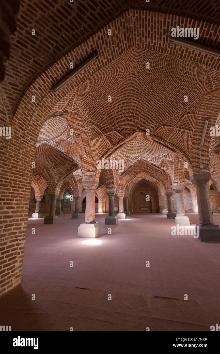 Detailed red brickwork forms the domed roof of a medersa in Tabriz, Iran Stock Photo