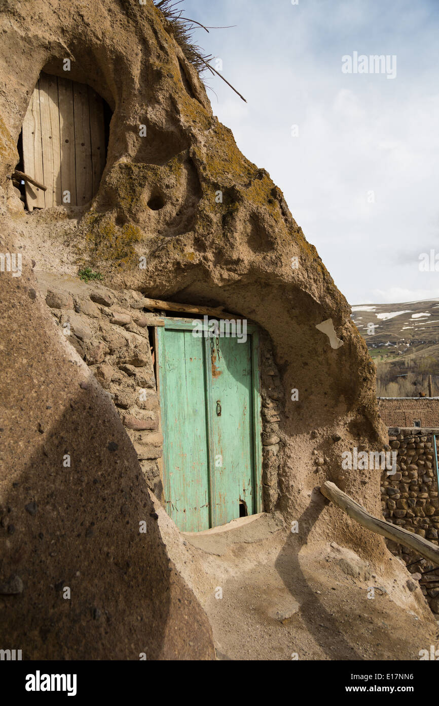 Stairs and doors carved into the rocks of Kandovan, Iran Stock Photo