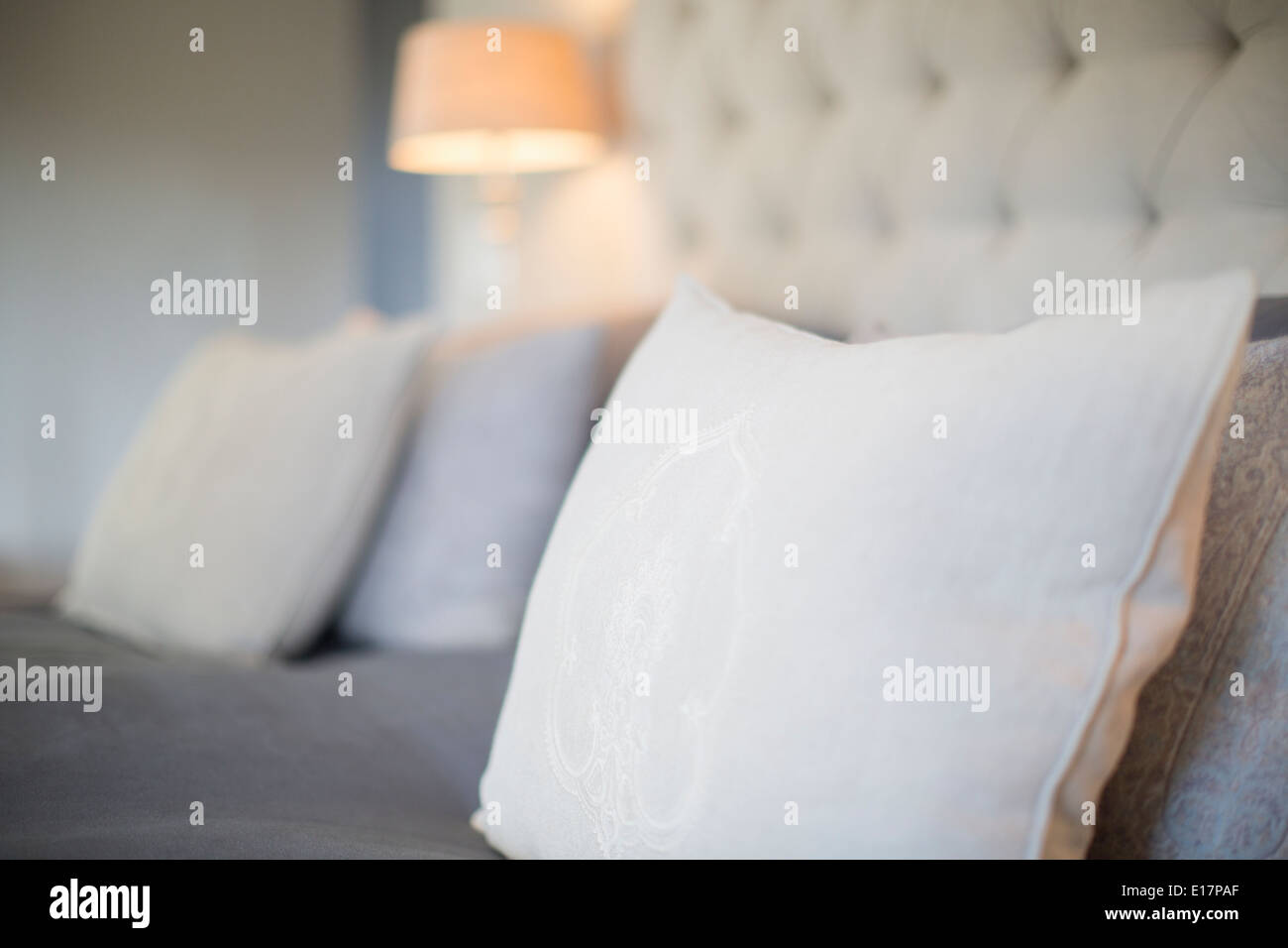 Pillows on bed in luxury bedroom Stock Photo