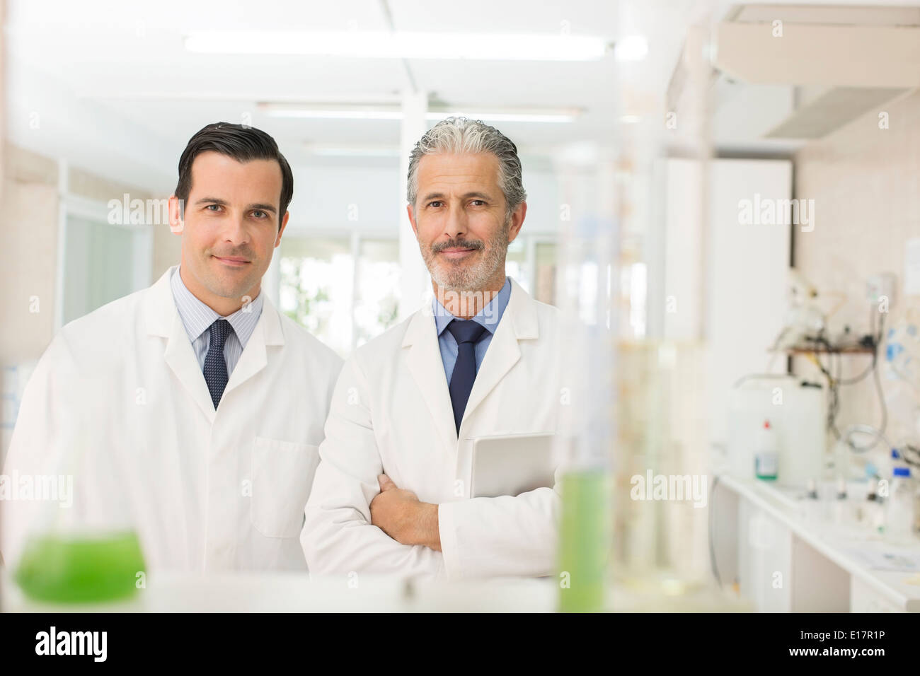 Portrait of confident scientists in laboratory Stock Photo