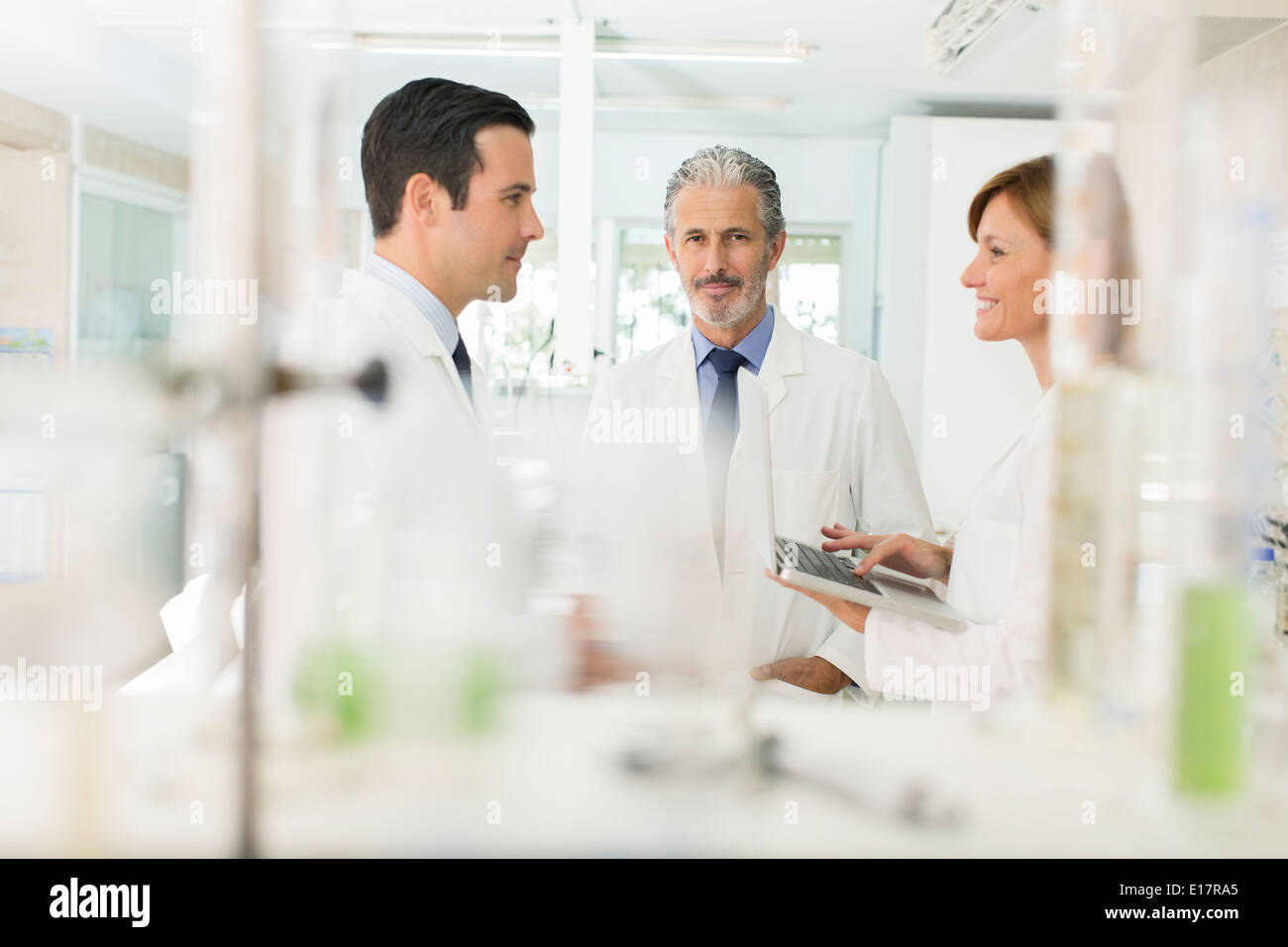 Scientists working in laboratory Stock Photo