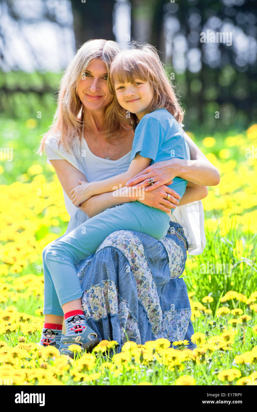 Mom holding son on lap hi-res stock photography and images - Alamy