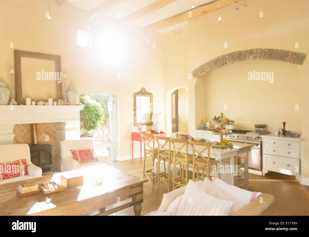 Sun shining through living room windows Stock Photo
