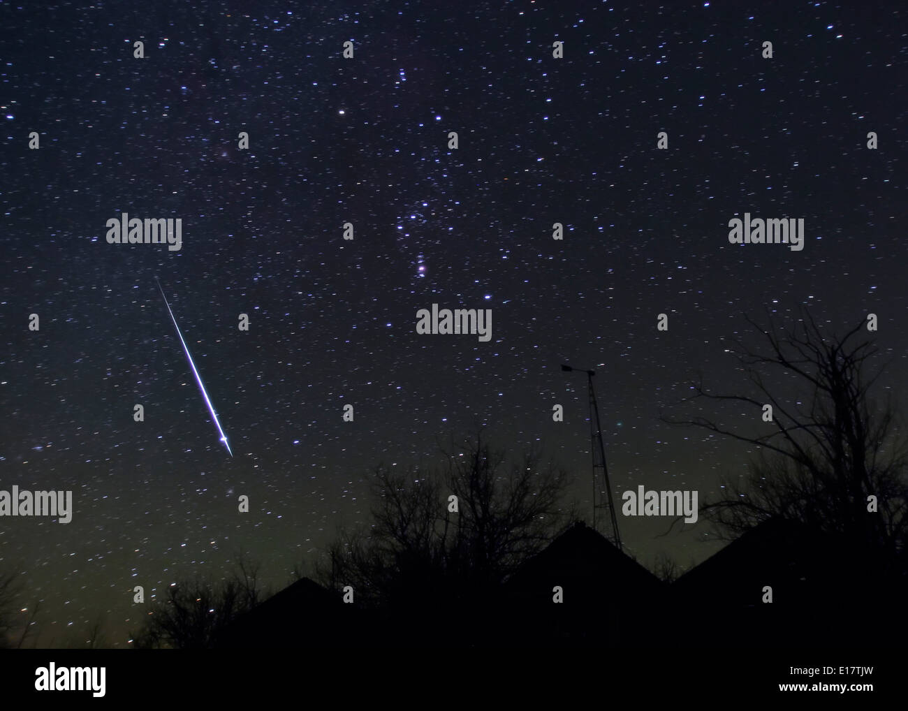 Geminid meteor caught Dec. 12, 2004 during Geminid metor shower, using Canon Digital Rebel set on tripiod (fixed camera) Stock Photo
