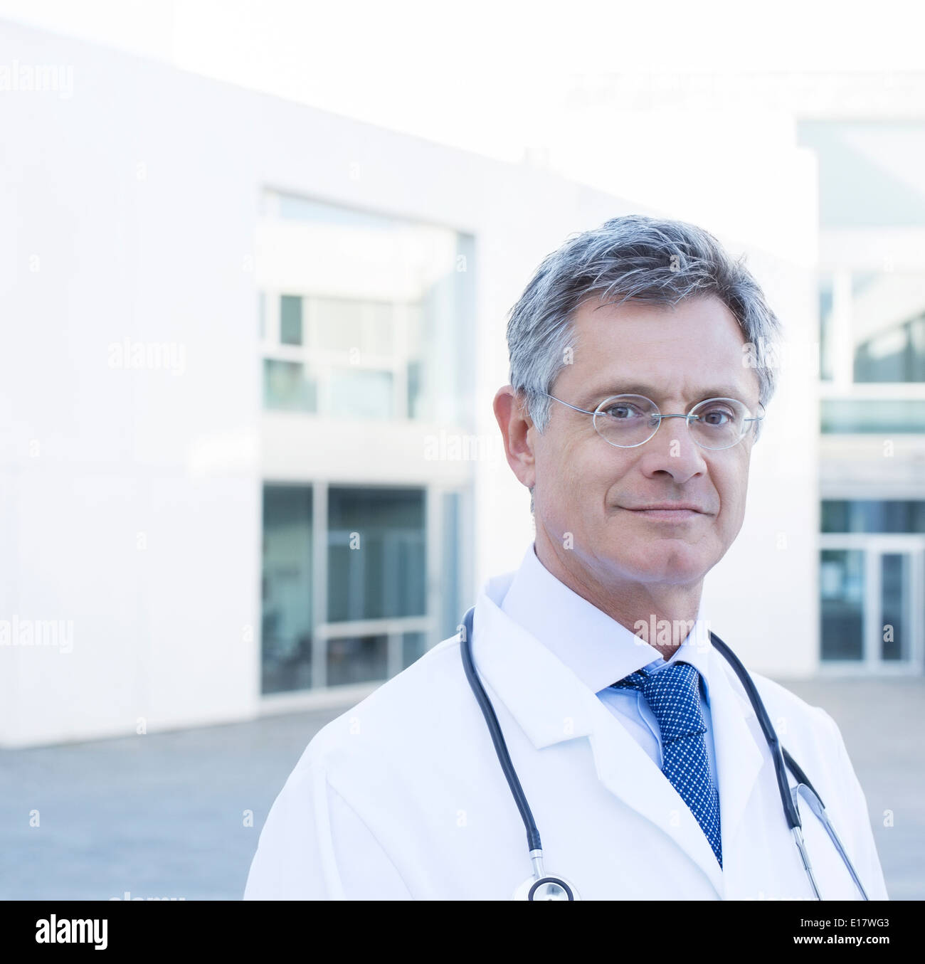 Doctor grey hair glasses hi-res stock photography and images - Alamy