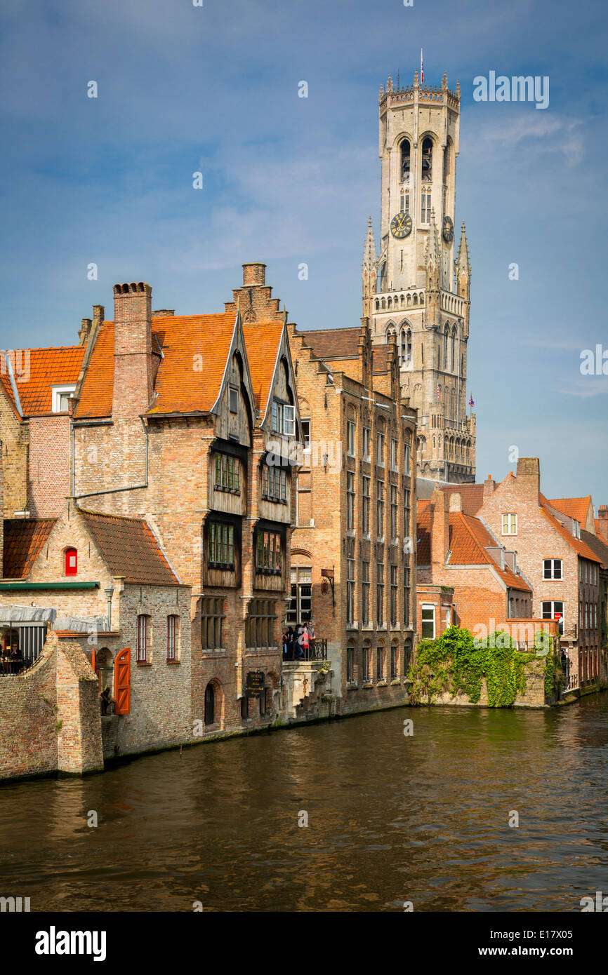 Belfry of Bruges towers over the buildings at the junction of the Groenerei and Dijver canals, Bruges, Belgium Stock Photo