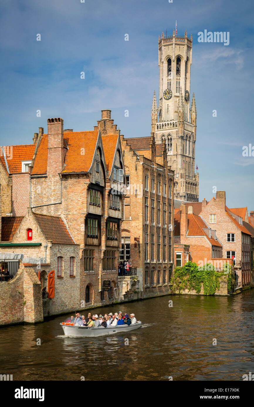 Belfry of Bruges towers over the buildings at the junction of the Groenerei and Dijver canals, Bruges, Belgium Stock Photo