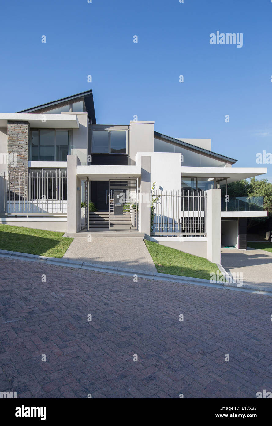 Modern house under blue sky Stock Photo - Alamy