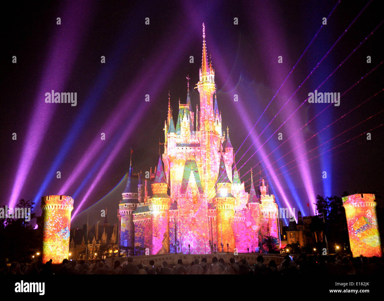 Tokyo, Japan. 26th May, 2014. Images of Disney characters are projected on the Cinderella castle at a press preview of the new attraction 'Once upon a time' at Tokyo Disneyland in Urayasu, suburban Tokyo, Japan, on May 26, 2014. Disney theme park will start the new attraction using projection mapping from May 29. © Ma Ping/Xinhua/Alamy Live News Stock Photo