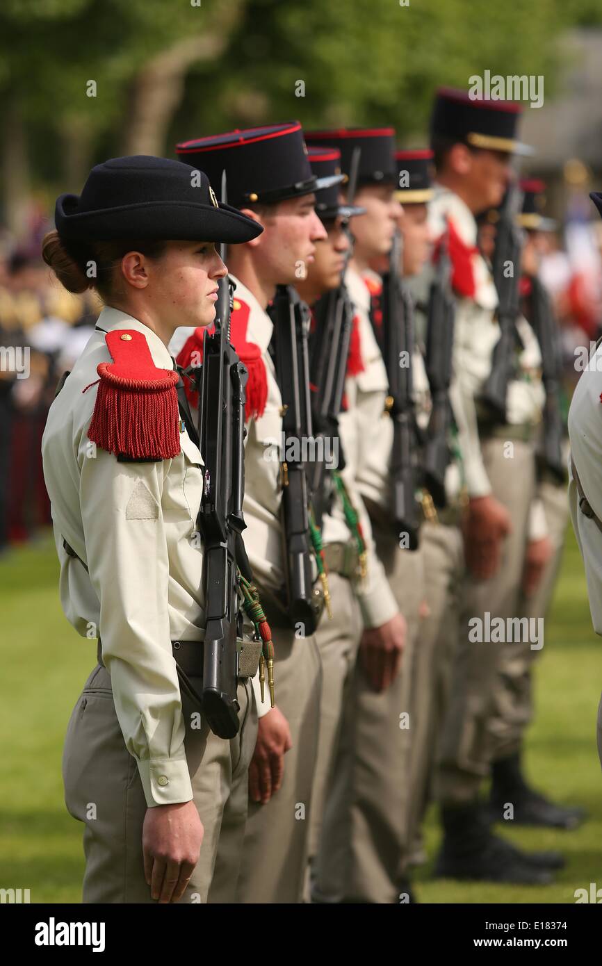 French 3rd Regiment d' Artillerie de Marine stand at attention in honor during a ceremony to mark the 96th anniversary of the historic Battle of Belleau Wood and Memorial Day at Aisne-Marne American Cemetery May 24, 2014 in Belleau, France. Stock Photo