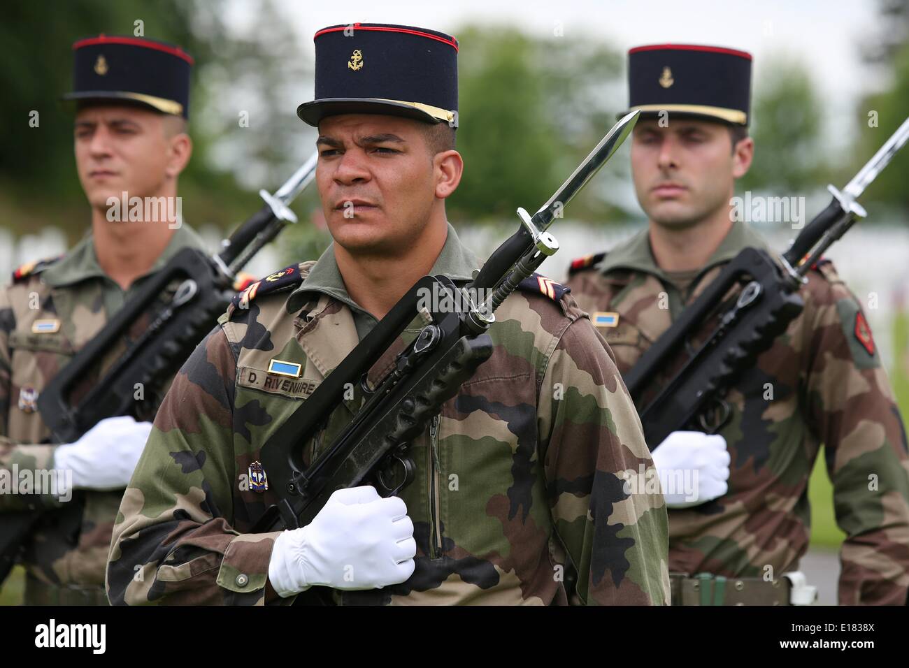 French Marines stand in honor during a ceremony to mark the 96th anniversary of the historic Battle of Belleau Wood and Memorial Day at Aisne-Marne American Cemetery May 24, 2014 in Belleau, France. Stock Photo