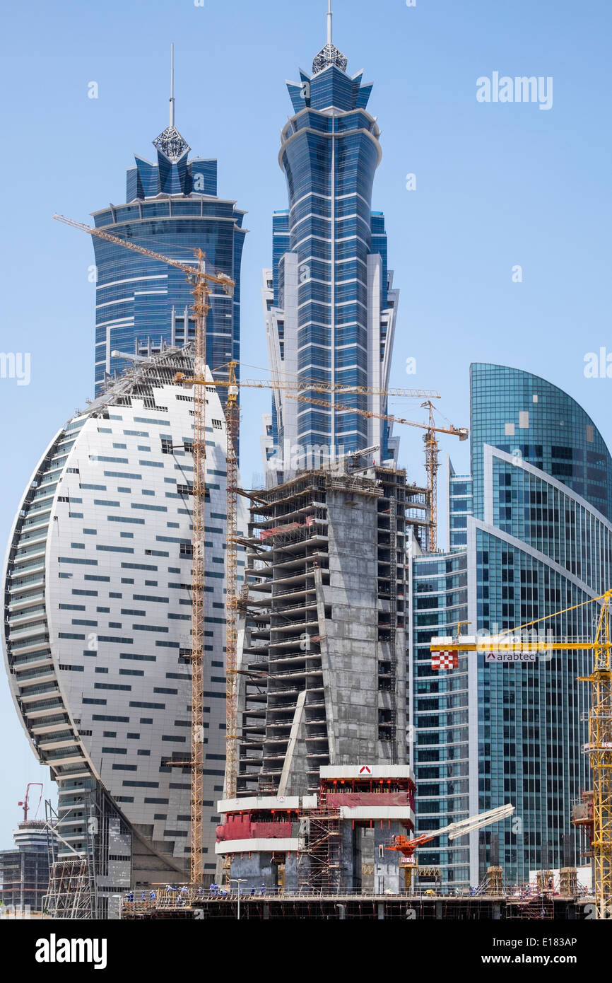 Construction site with many skyscrapers being built in new Business Bay district  in Dubai United Arab Emirates Stock Photo