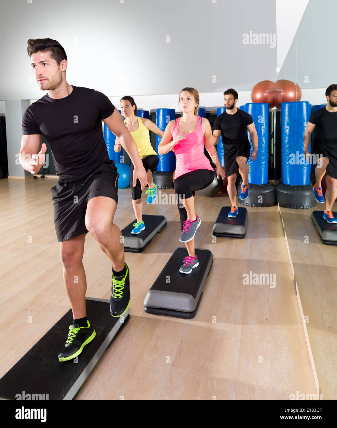 Cardio step dance people group at fitness gym training workout Stock Photo  - Alamy