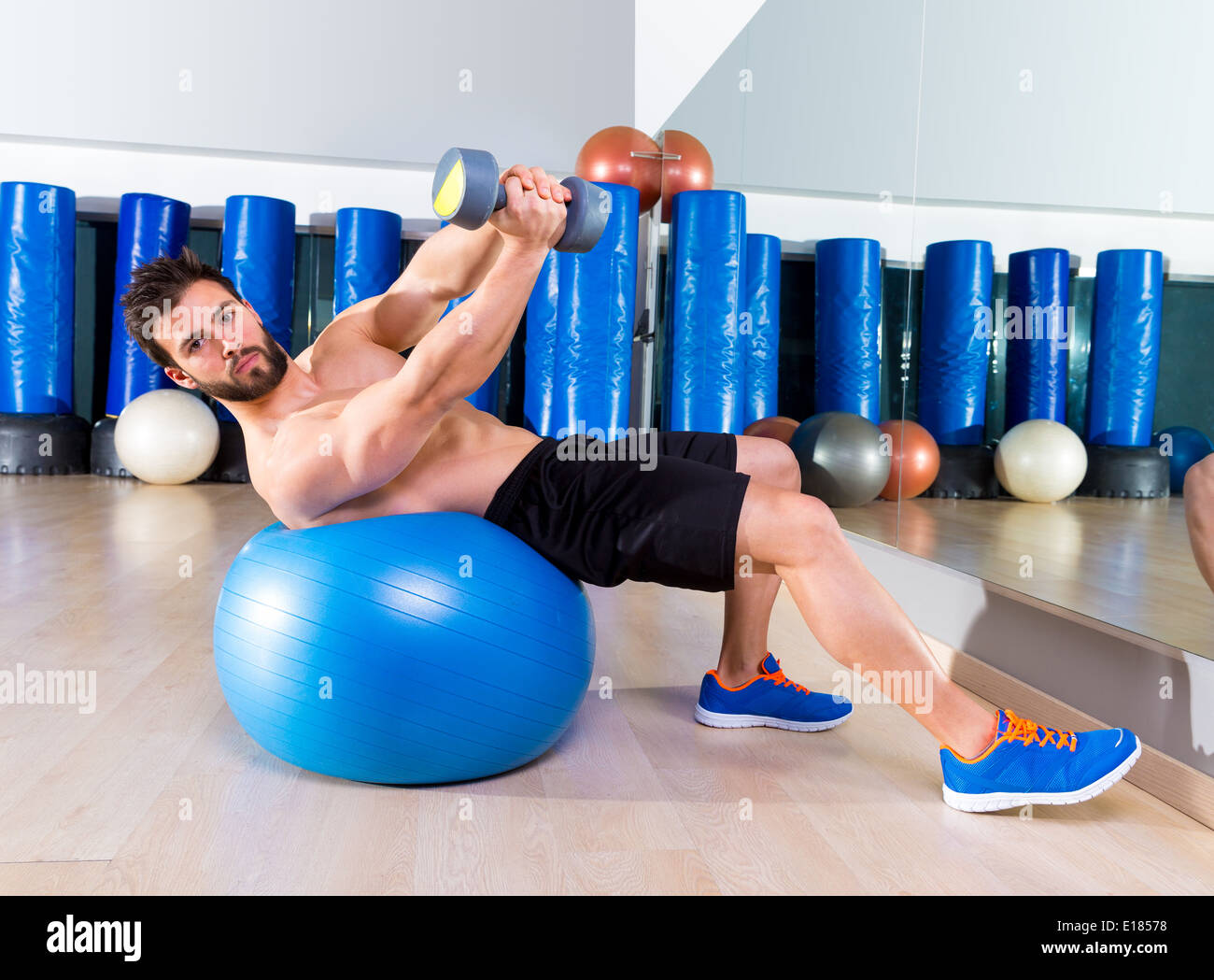 Swiss ball dumbbell press hires stock photography and images Alamy