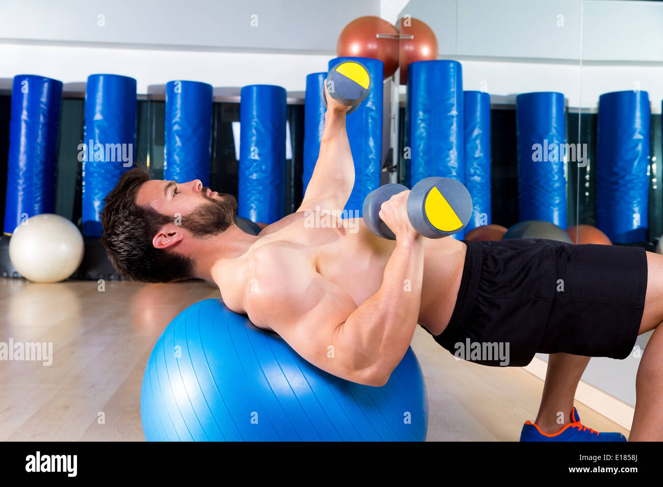 Swiss ball dumbbell press hires stock photography and images Alamy