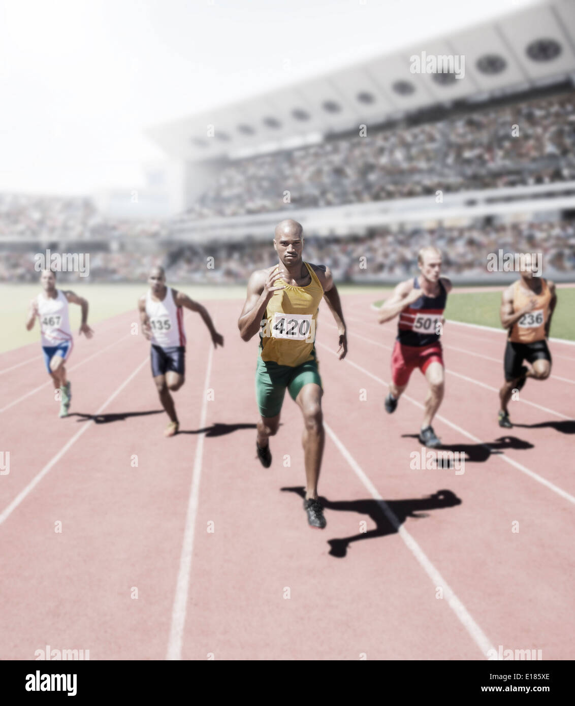 Runners racing on track Stock Photo Alamy