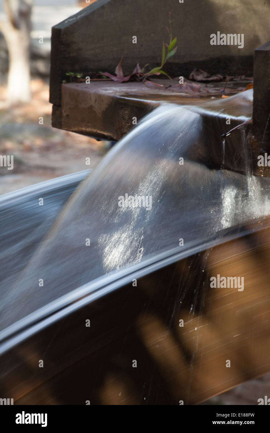 Water turning a Mill water wheel Stock Photo - Alamy
