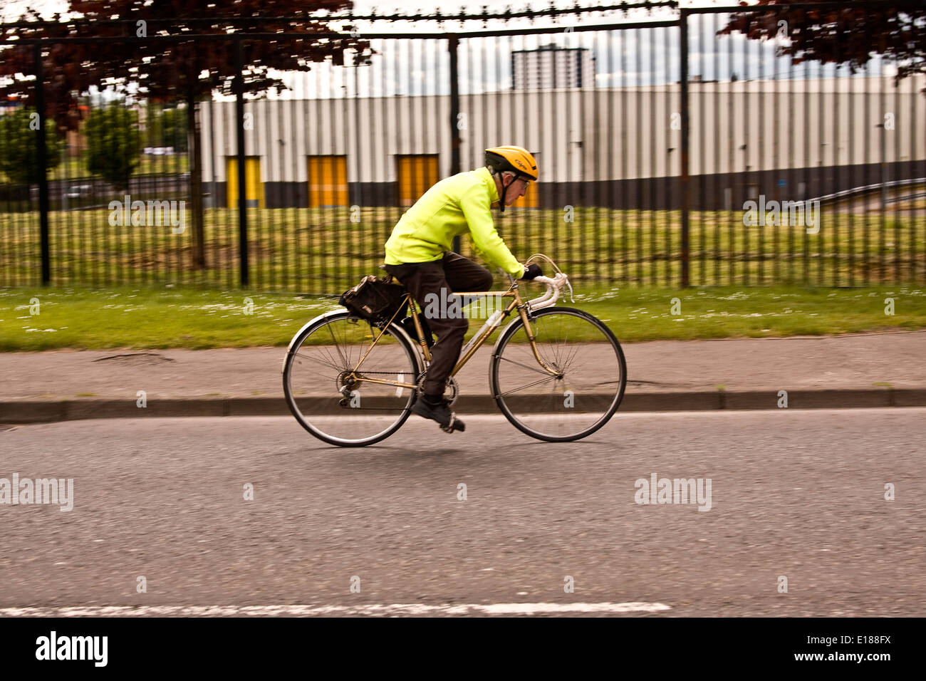 An Old Age Pensioner cycling leisurely along MacAlpine Road in Dundee