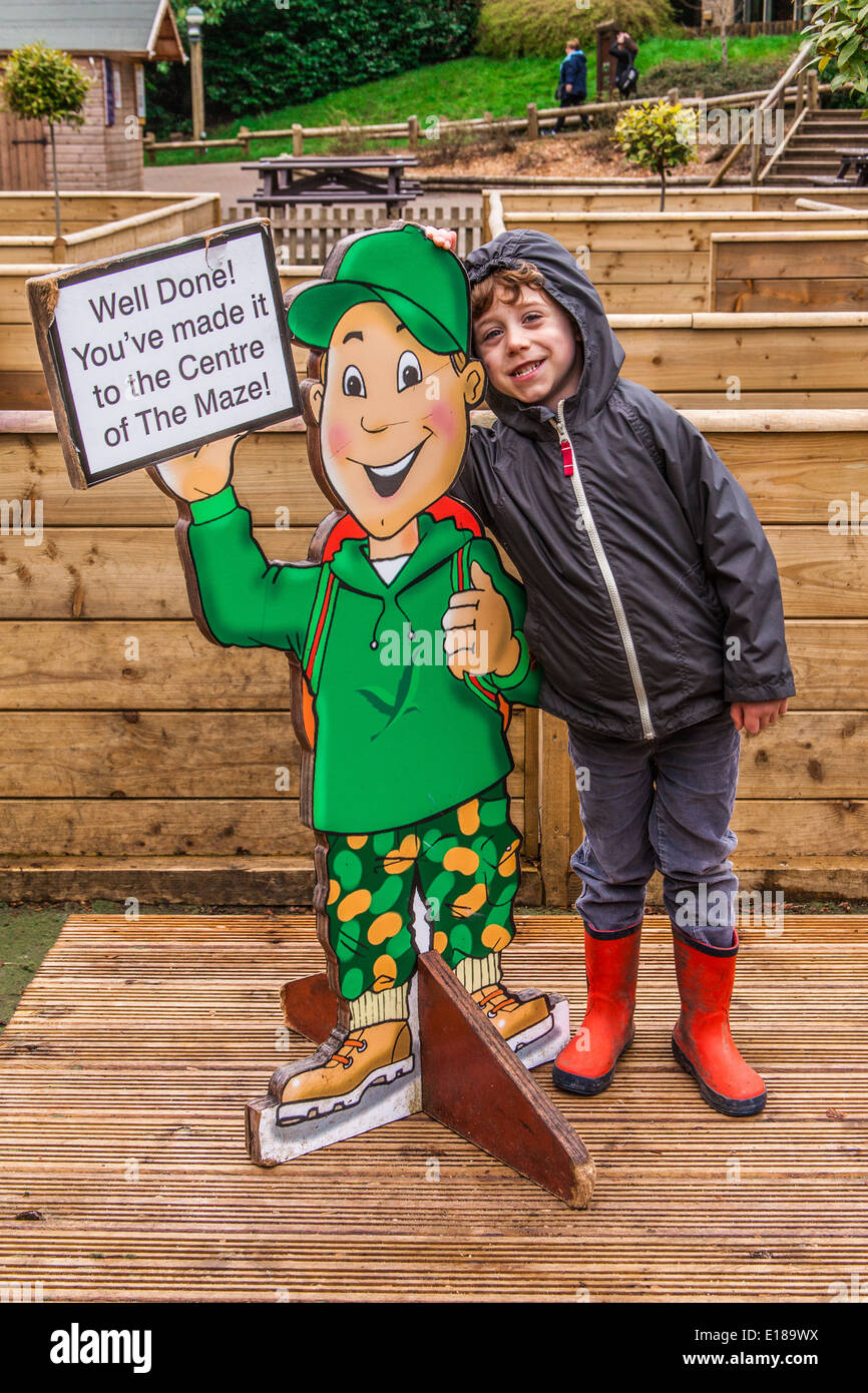 Five year old boy in the maze at center parcs resort, Longleat, England, United Kingdom. Stock Photo