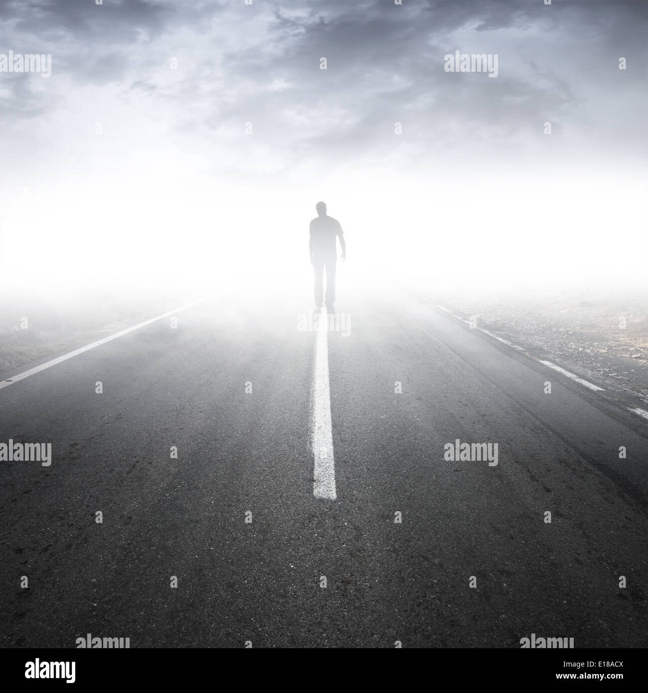Man walking road alone hi-res stock photography and images - Alamy