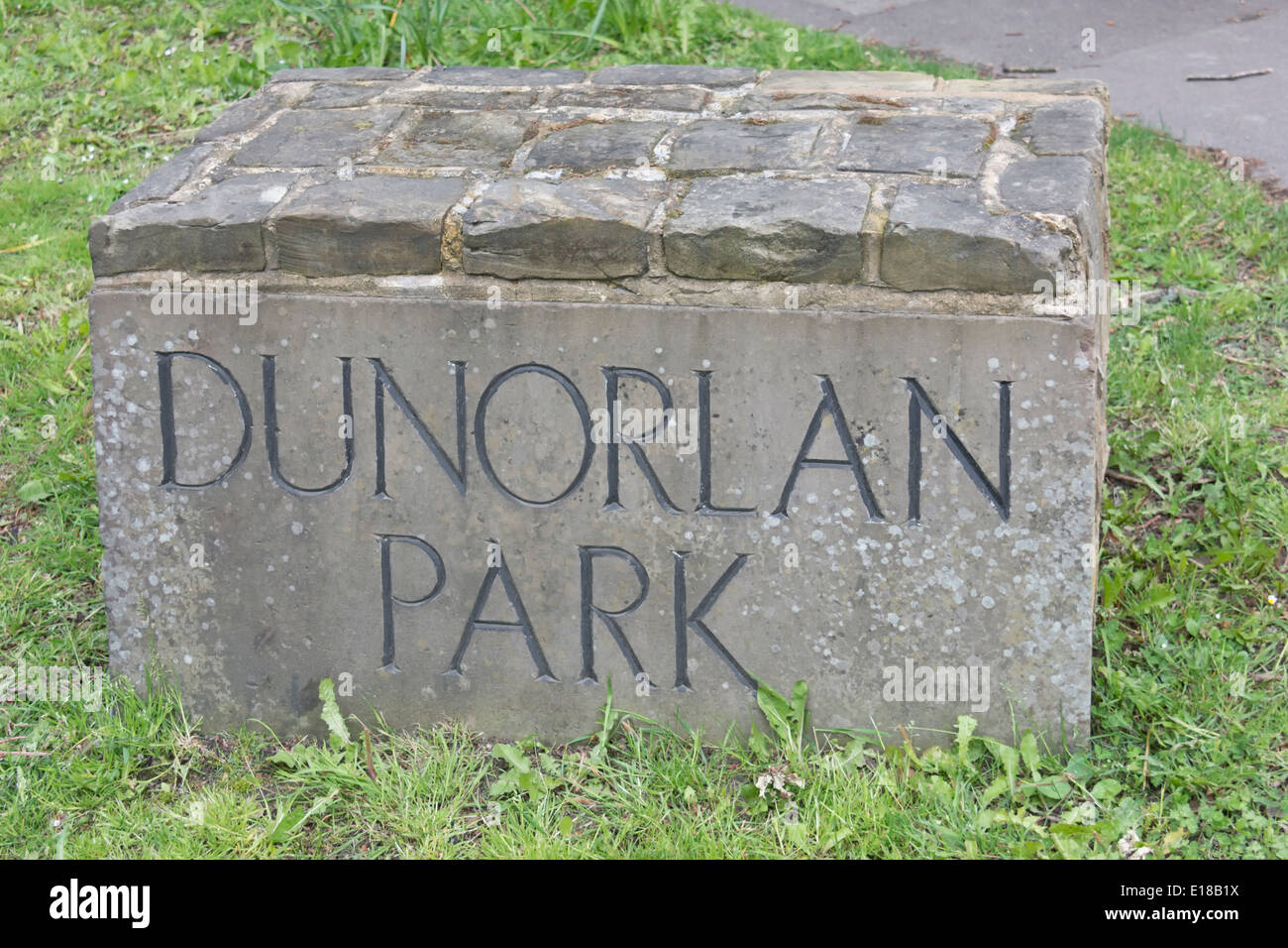 A marker stone at the entrance to Dunorlan Park on Pembury Road in Royal Tunbridge Wells, Kent. Stock Photo