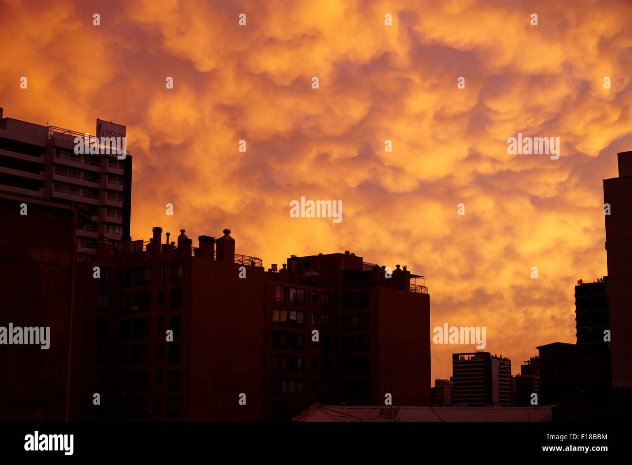 sunset reflecting off stratocumulus cloud deck over the city of Santiago Chile Stock Photo
