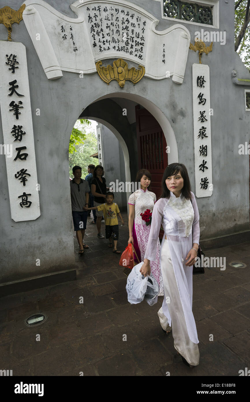A group of visitors depart from the Ngoc Son Temple, the most famous temple in the city of Hanoi. Stock Photo