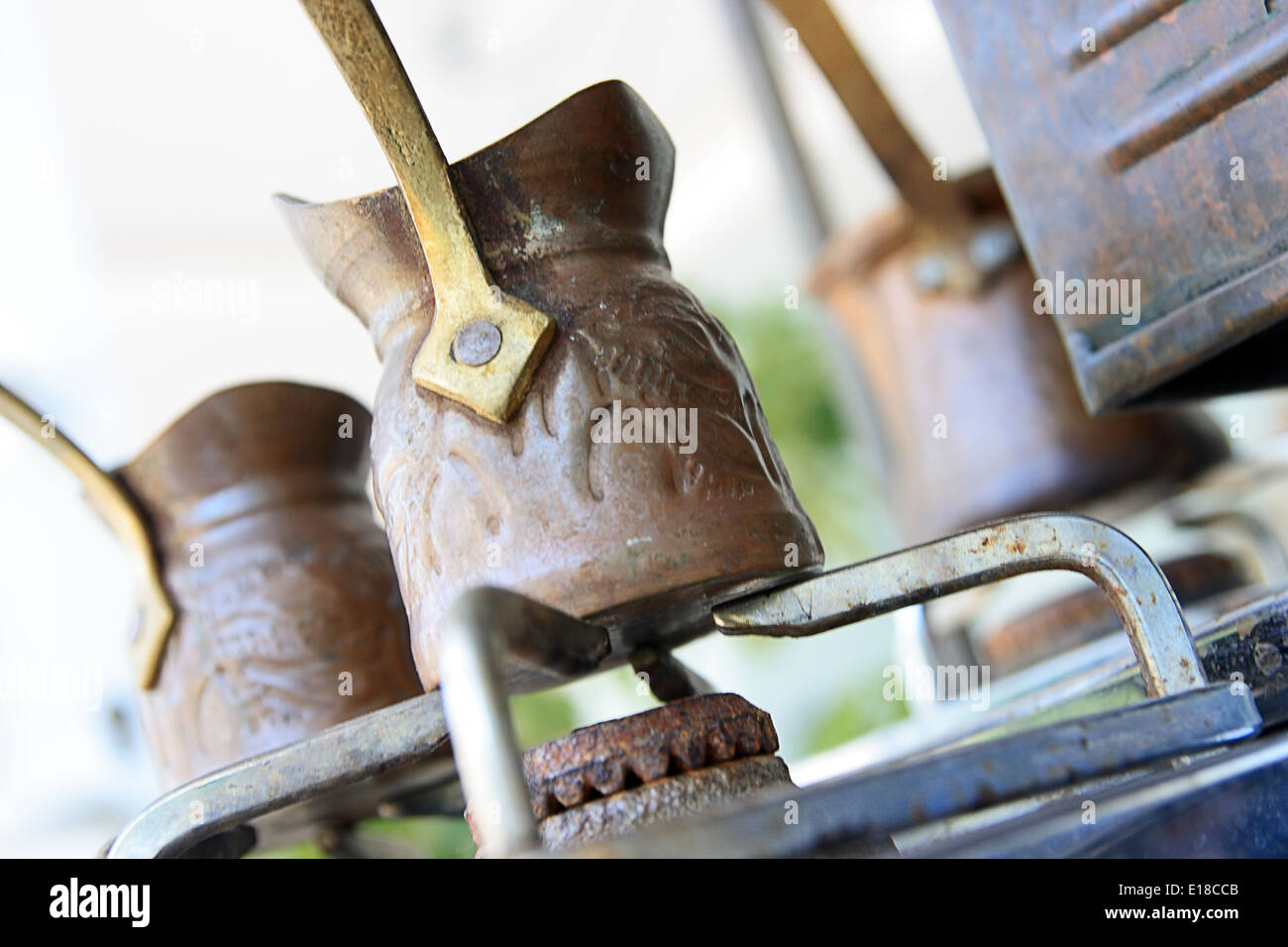 old-fashioned turkish coffee pots on the gas-stove Stock Photo