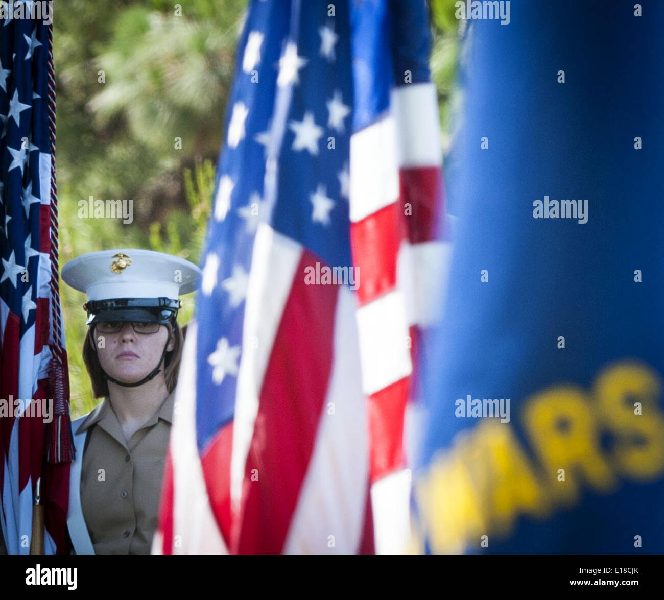 Dana Point, California, USA. 26th May, 2014. A lady Marine, as part of the 5th Marine Regiment Honor Guard, stands by to present the colors on Memorial Day on Monday, May 26, 2014.----Dana Point's Veterans of Foreign Wars Post 9934, along with the Ladies Auxiliary and the City of Dana Point, hosted this year's Memorial Day Ceremony at Pines Park in Capistrano Beach. Credit:  ZUMA Press, Inc./Alamy Live News Stock Photo