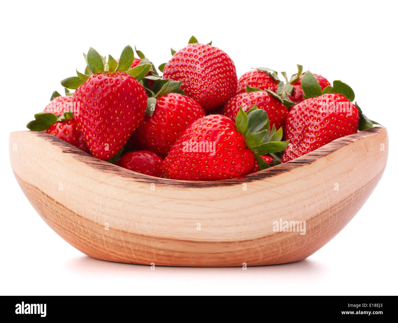 Strawberries in wooden bowl isolated on white background cutout Stock ...