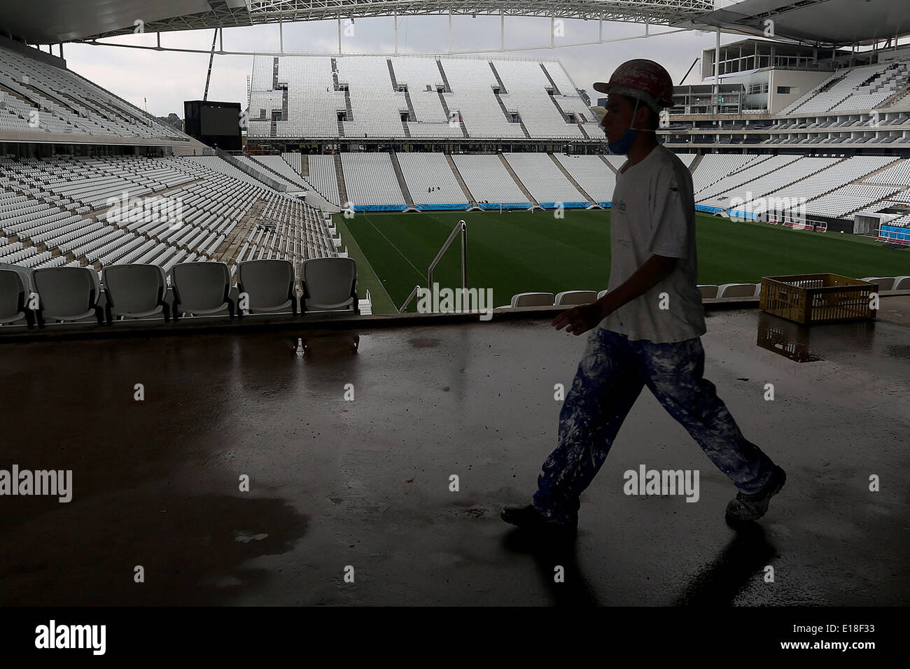Sao Paulo, Brazil. 26th May, 2014. A worker walks inside the Sao Paulo Arena, in Sao Paulo city, Brazil, on May 26, 2014. The stadium also known as Corinthians Arena, will be the seat of the opening match of theBrazil 2014 FIFA World Cup on June 12. © Rahel Patrasso/Xinhua/Alamy Live News Stock Photo