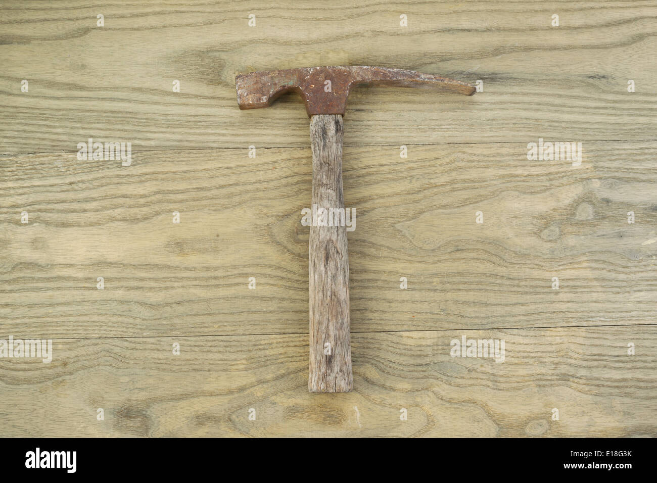 Horizontal photo of an old masonry hammer on aged wood Stock Photo Alamy