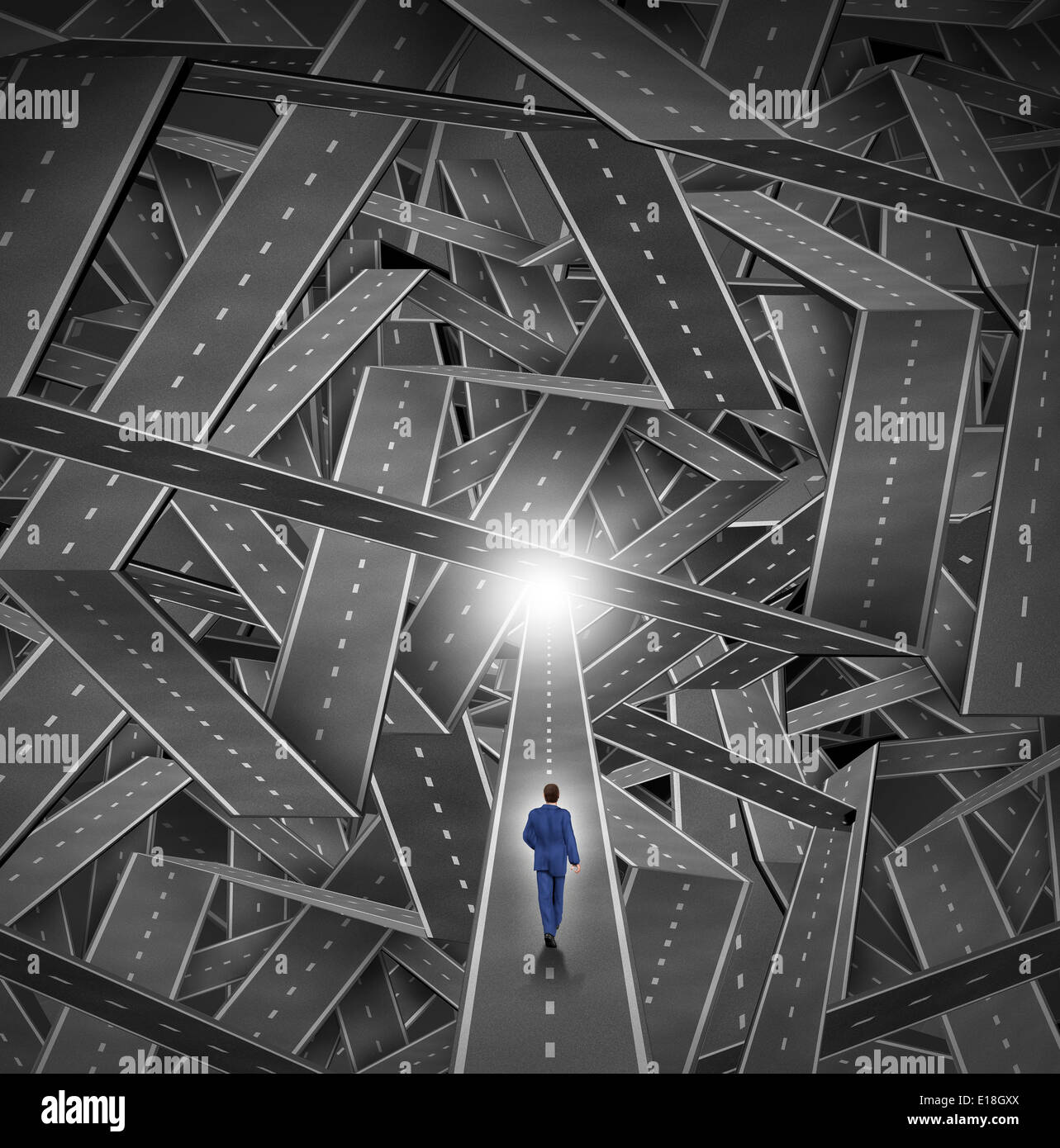 Crisis manager business concept as a businessman walkig through a maze and direction chaos with a mountain of tangled sharp turn roads as a financial metaphor for managing challenging organization situations with courage and expertise. Stock Photo