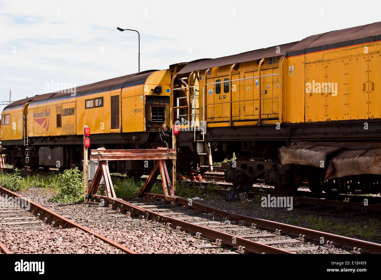 Engineers carrying out maintenance work on the New Loram Rail Grinder