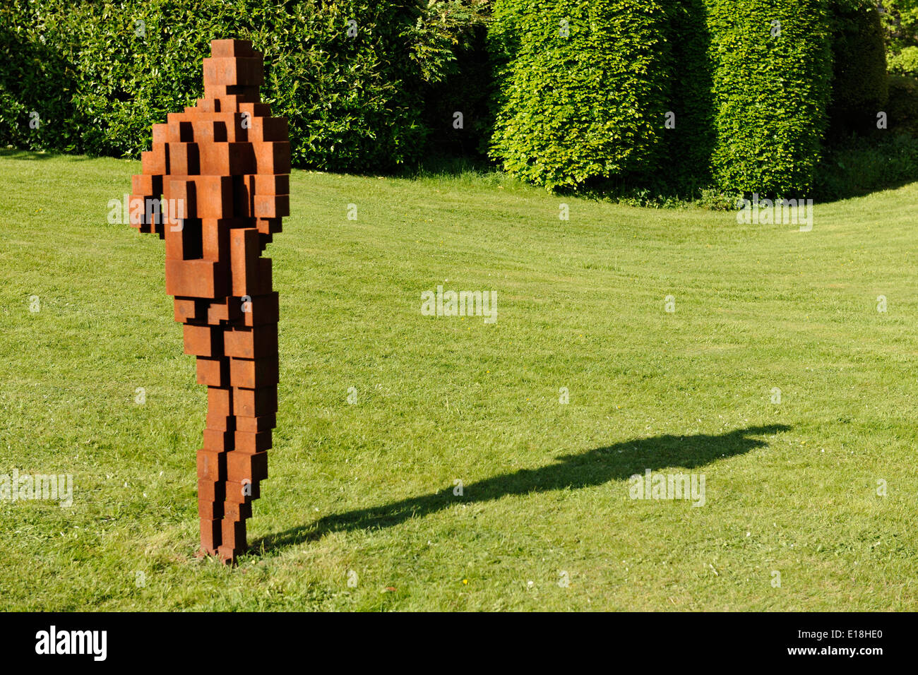 Anthony Gormley sculpture or statue, in the grounds of Belcombe Court, Bradford-on-Avon, Wiltshire. Stock Photo