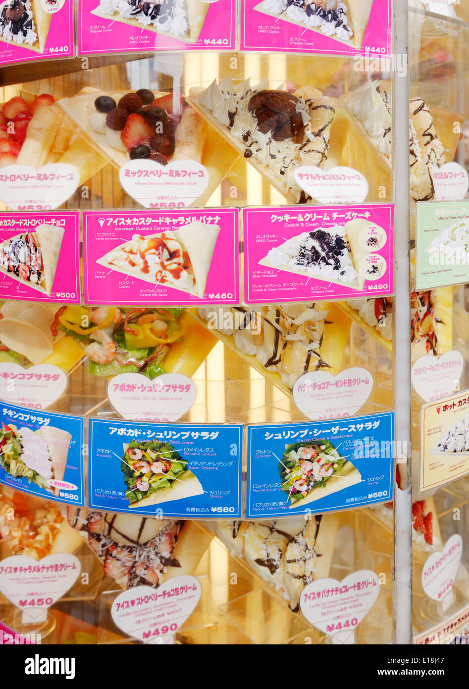 Fake food replicas, Sampuru in window display showing crepes, food stand menu in Tokyo, Japan. Stock Photo