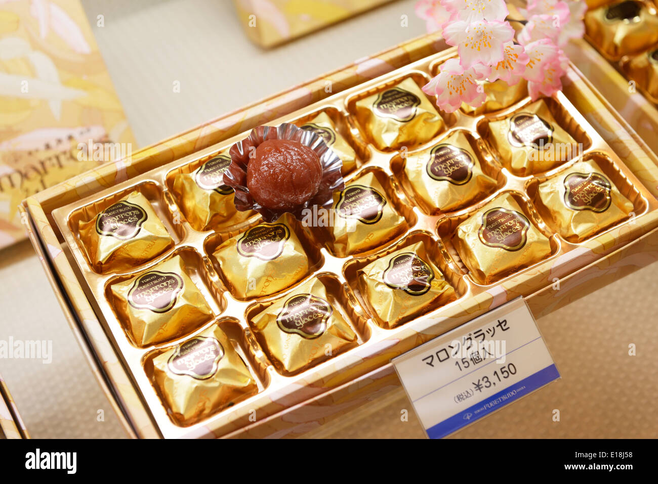 Marron glaces candied chestnut confections in a box at Japanese store. Tokyo, Japan. Stock Photo