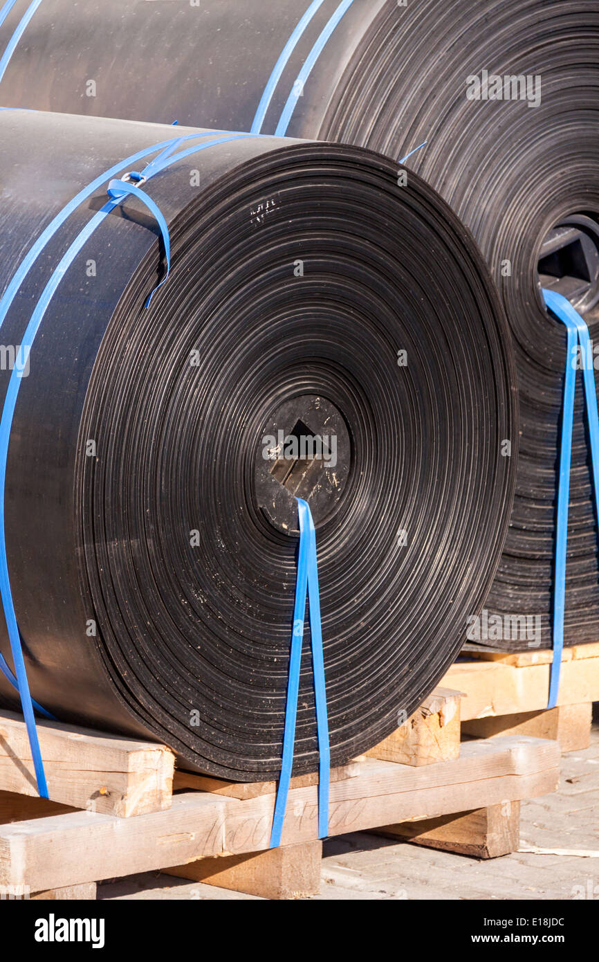 Rolls of black industrial plastic Stock Photo Alamy