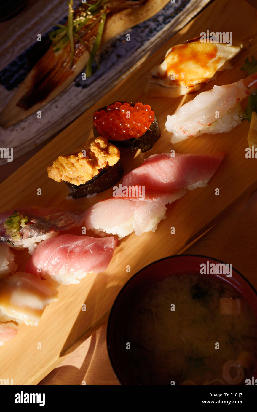 Closeup of nigiri sushi and smoked eel at a Japanese sushi restaurant. Tokyo, Japan Stock Photo