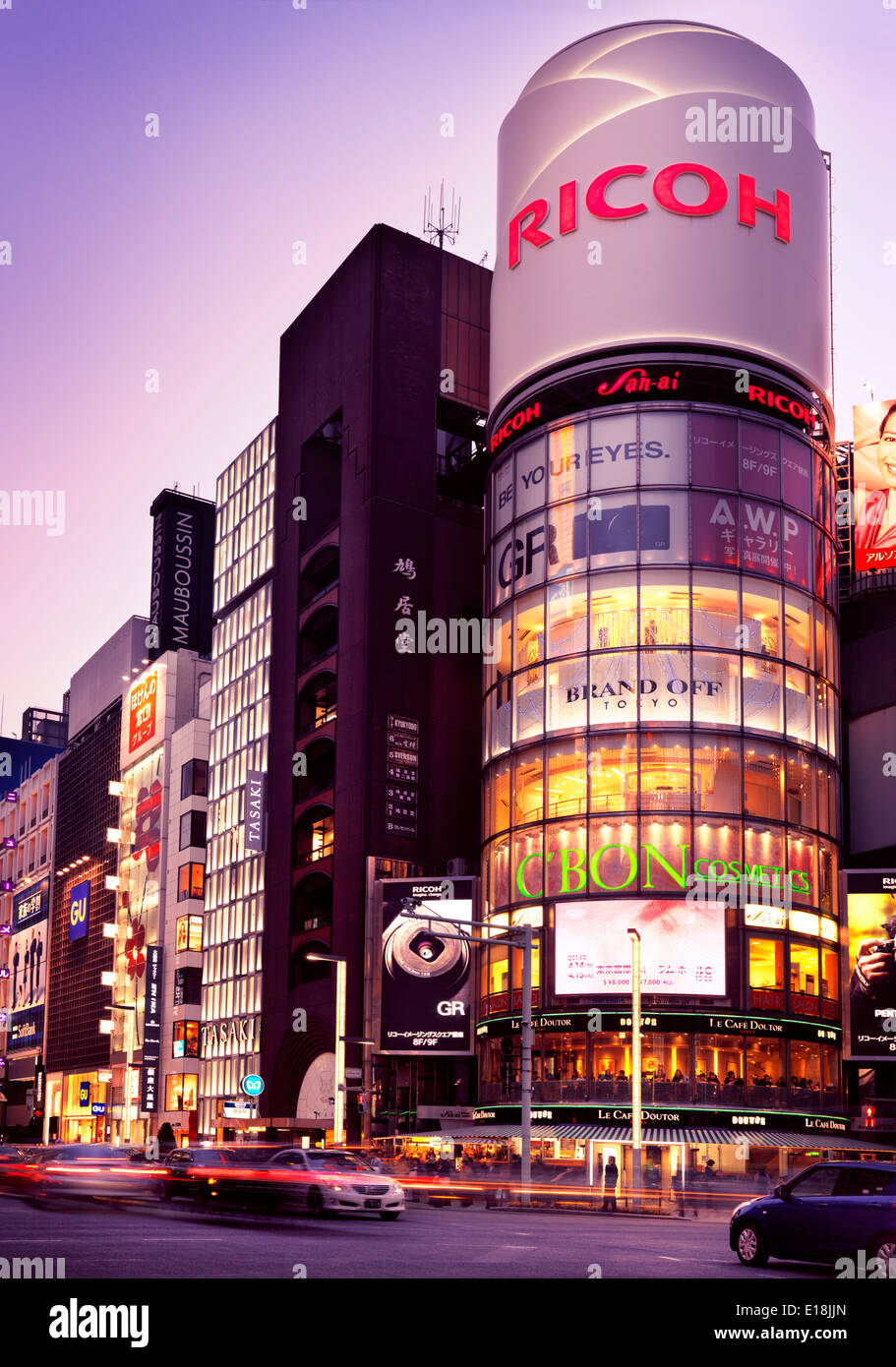 Ricoh building and colorful signs on Chuo Dori street at night in Ginza, Tokyo, Japan 2014. Stock Photo