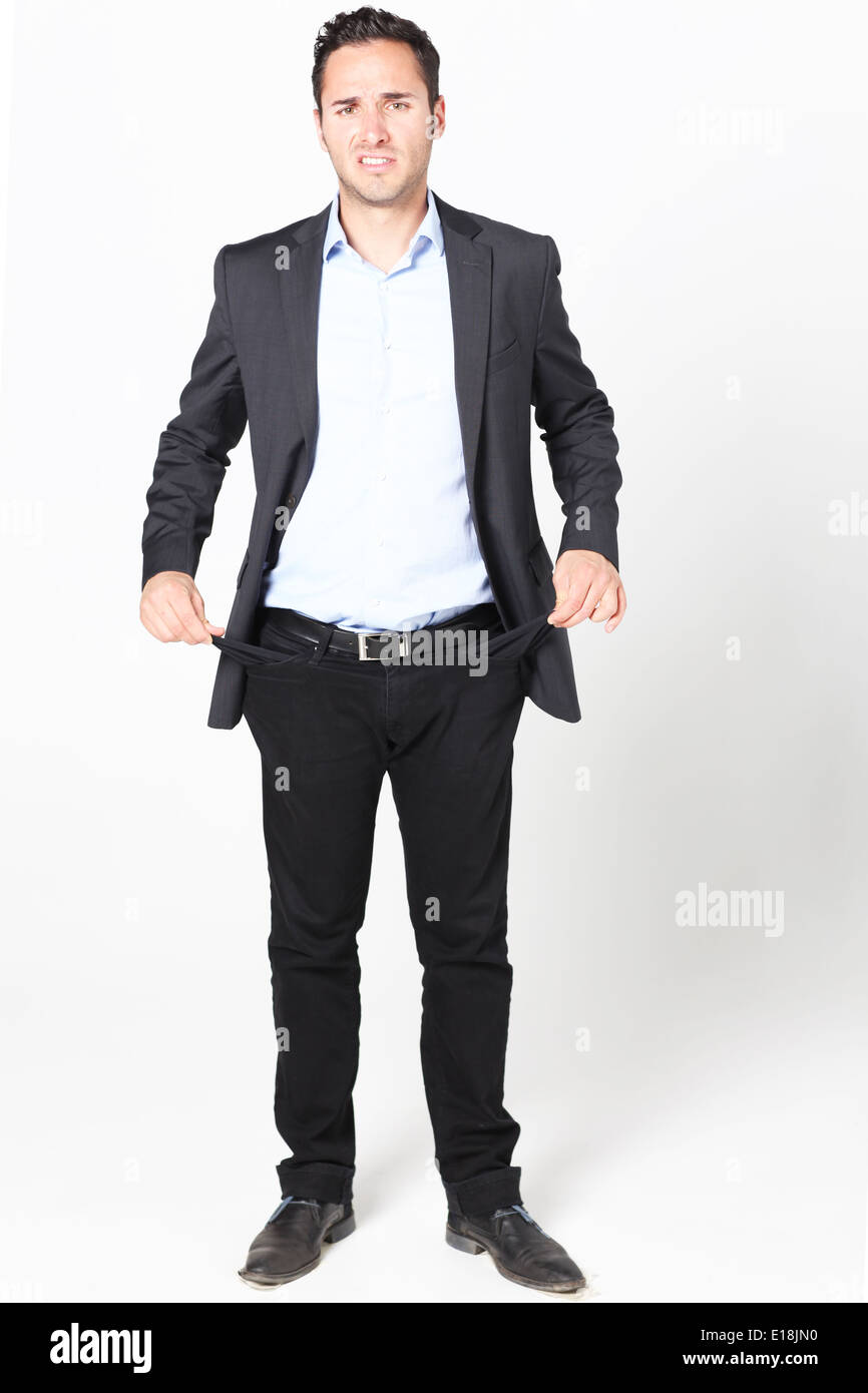 businessman showing his empty trouser pockets Stock Photo