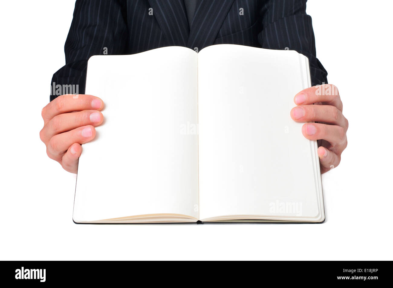 a businessman showing a notebook with blank pages Stock Photo