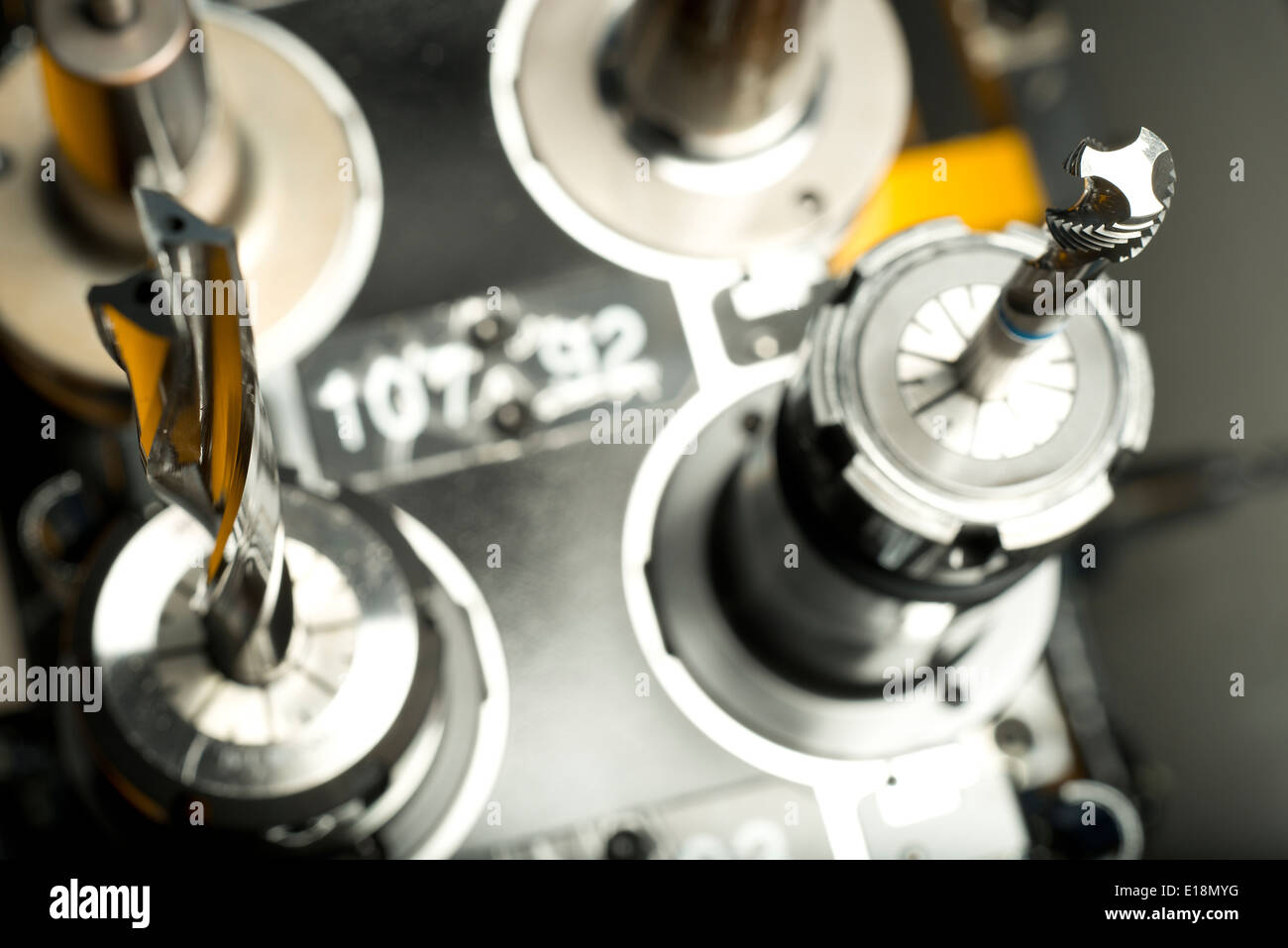 Drill bits for machining metal parts, in an engineering factory Stock