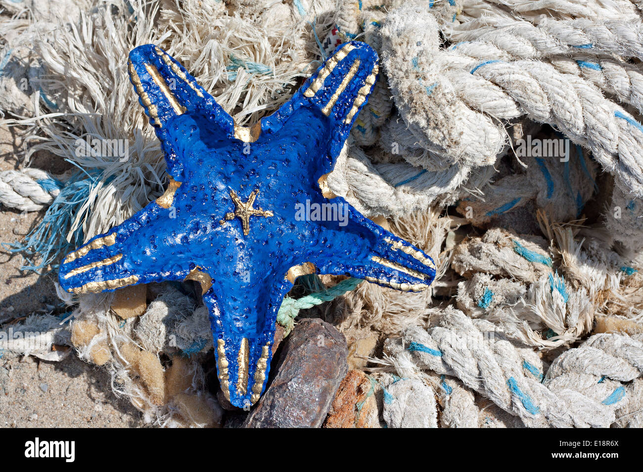 Blue starfish shape on fisherman's ropes Stock Photo - Alamy