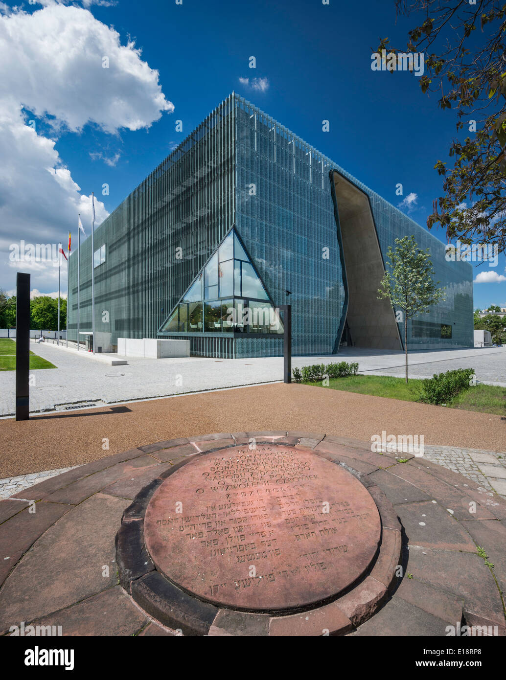 Museum of the History of Polish Jews, opened in 2013, sign honoring Ghetto fighters, placed in 1946, in front, Warsaw, Poland Stock Photo