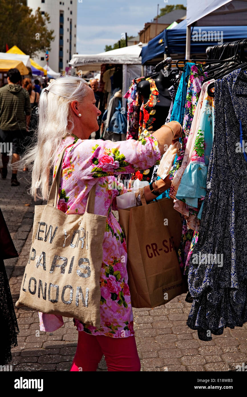 Hobart Australia / A woman clothes shopping at the Salamanca Market in