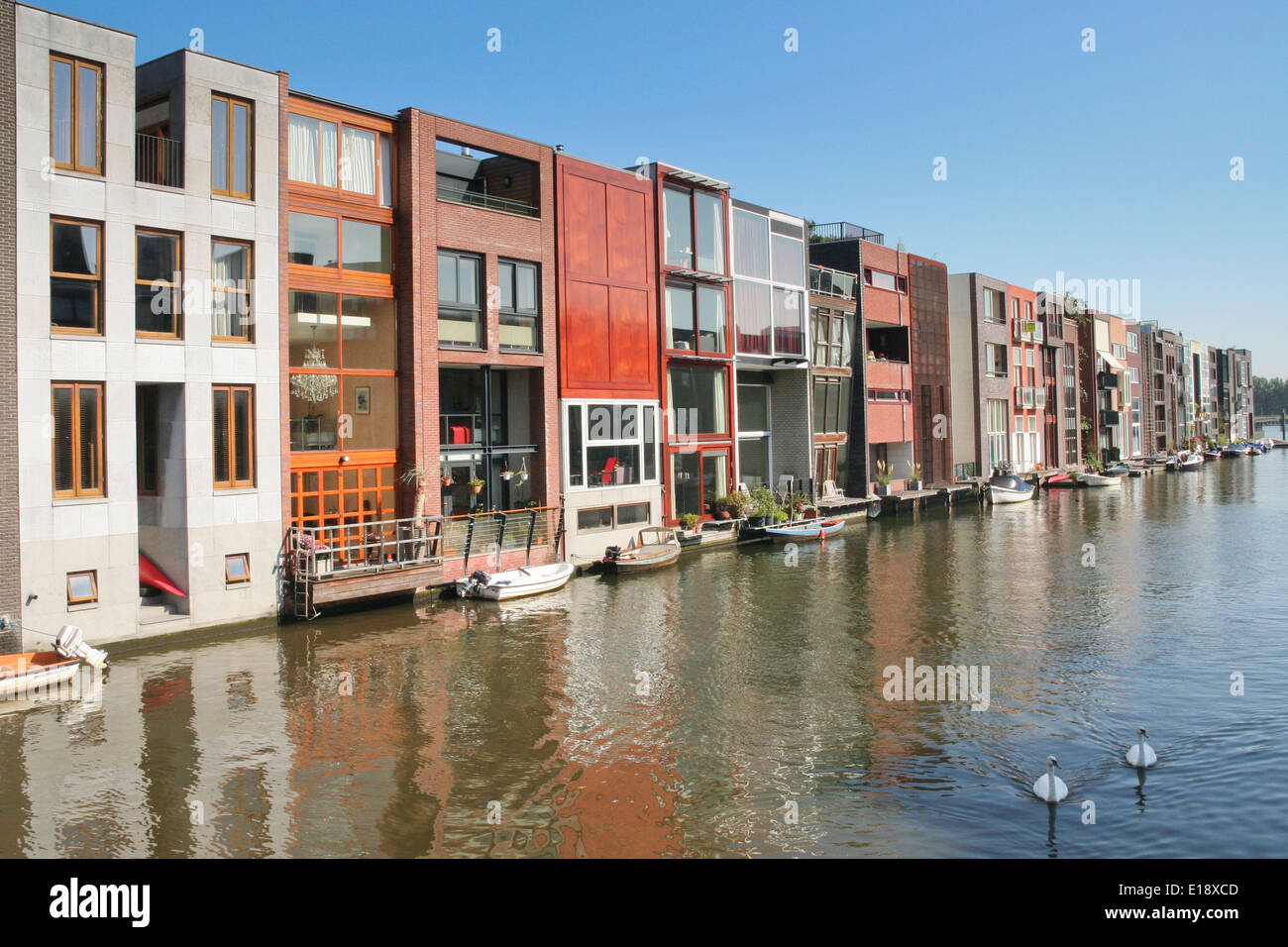 Row of self build canal houses in Borneo Island Amsterdam Stock Photo