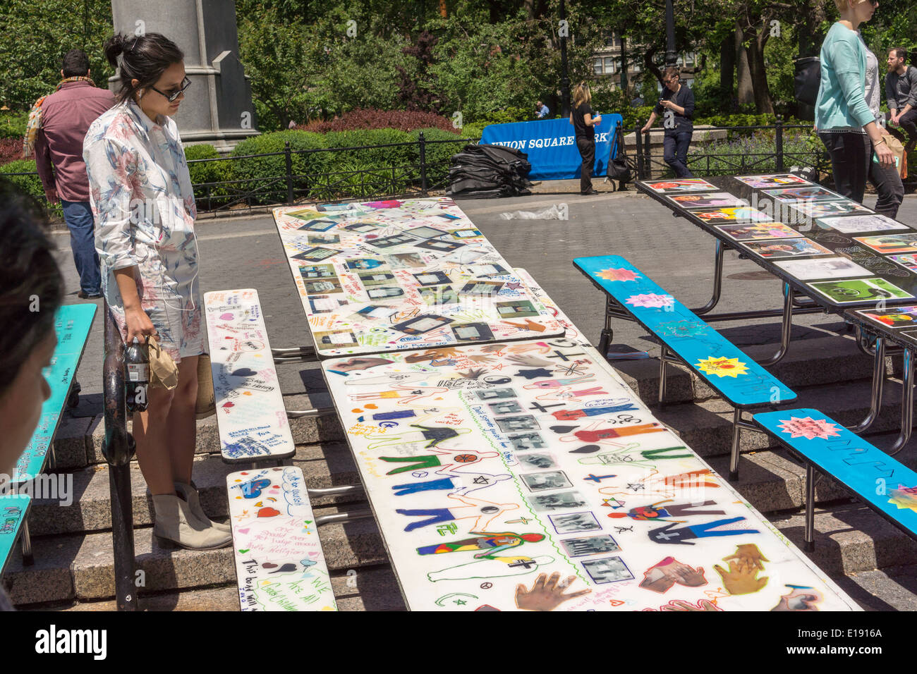 School lunchroom tables decorated with art representing various social issues are seen in Union Square Park in New York Stock Photo